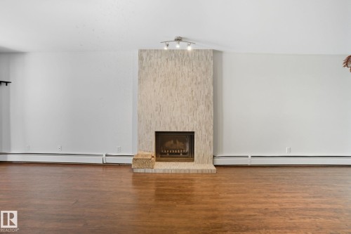 3 10032 113 Street, Edmonton, AB - Indoor With Fireplace