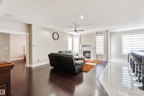 3948 Claxton Loop, Edmonton, AB - Indoor Photo Showing Living Room With Fireplace
