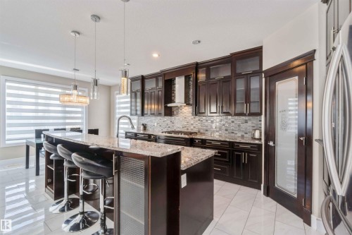 3948 Claxton Loop, Edmonton, AB - Indoor Photo Showing Kitchen With Upgraded Kitchen
