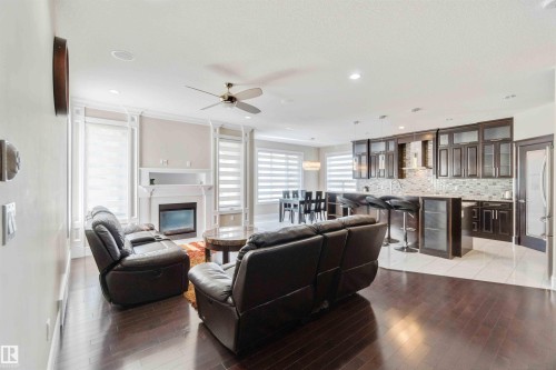 3948 Claxton Loop, Edmonton, AB - Indoor Photo Showing Living Room With Fireplace