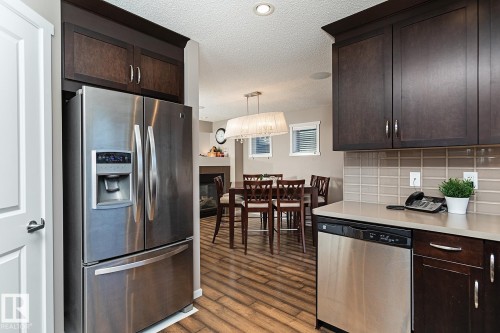 1117 Chappelle Boulevard, Edmonton, AB - Indoor Photo Showing Kitchen With Stainless Steel Kitchen
