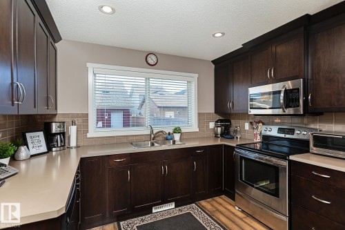 1117 Chappelle Boulevard, Edmonton, AB - Indoor Photo Showing Kitchen With Double Sink