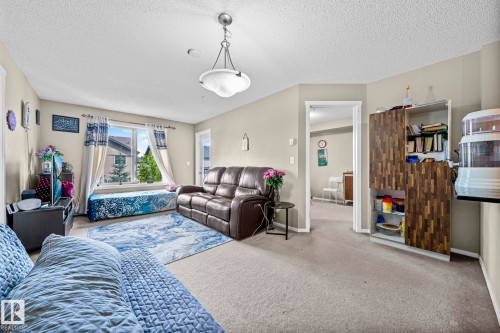 203 3207 James Mowatt Trail Sw, Edmonton, AB - Indoor Photo Showing Living Room