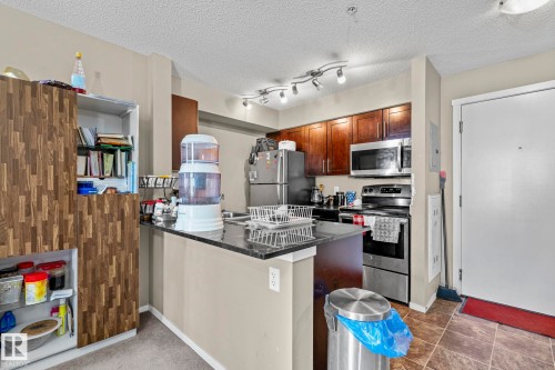 203 3207 James Mowatt Trail Sw, Edmonton, AB - Indoor Photo Showing Kitchen