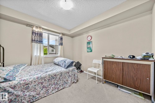 203 3207 James Mowatt Trail Sw, Edmonton, AB - Indoor Photo Showing Bedroom