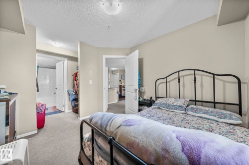 203 3207 James Mowatt Trail Sw, Edmonton, AB - Indoor Photo Showing Bedroom