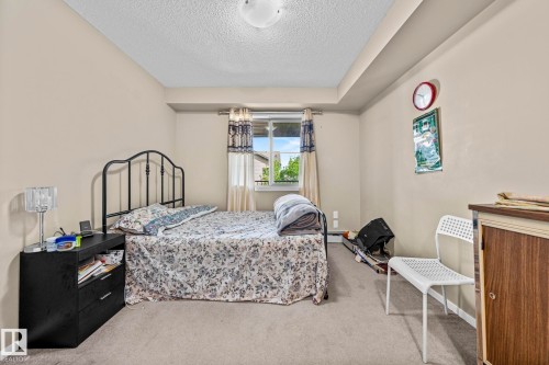203 3207 James Mowatt Trail Sw, Edmonton, AB - Indoor Photo Showing Bedroom