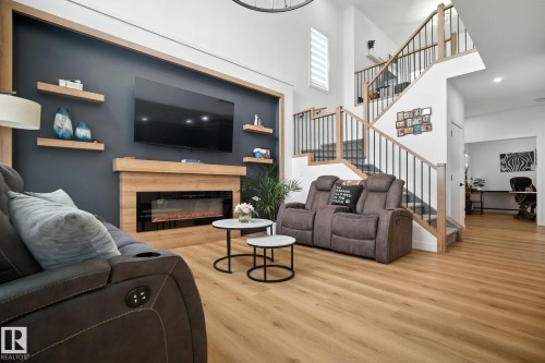 50 Grassview Crescent, Spruce Grove, AB - Indoor Photo Showing Living Room With Fireplace