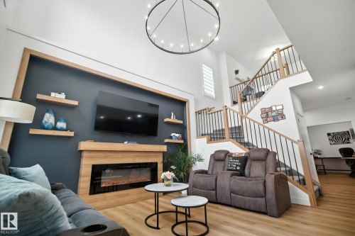 50 Grassview Crescent, Spruce Grove, AB - Indoor Photo Showing Living Room With Fireplace