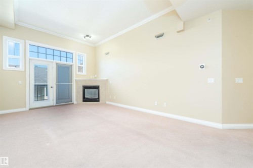 419 12408 15 Avenue, Edmonton, AB - Indoor With Fireplace