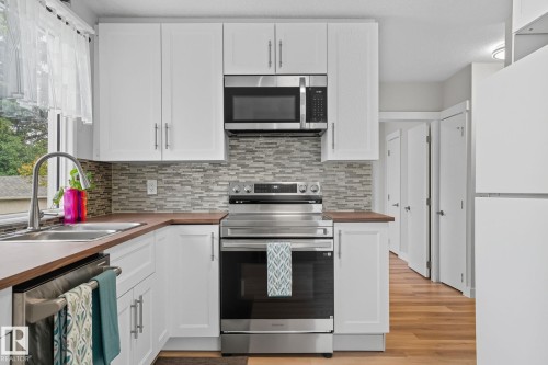 11222 71 Avenue, Edmonton, AB - Indoor Photo Showing Kitchen With Stainless Steel Kitchen With Double Sink