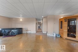 Interior space with baseboards and a sauna - 