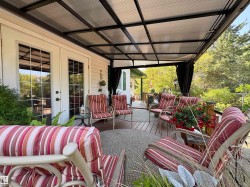 View of patio featuring a wooden deck and french doors - 