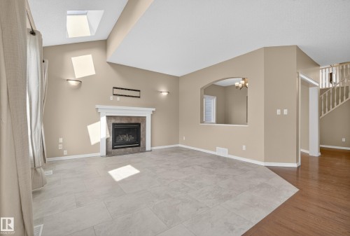 1212 82 Street, Edmonton, AB - Indoor Photo Showing Living Room With Fireplace