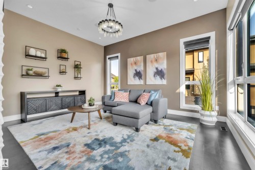 4727 Woolsey Common, Edmonton, AB - Indoor Photo Showing Living Room