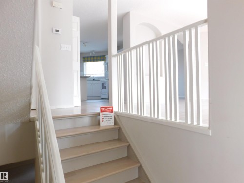 View of staircase - 26 1295 Carter Crest Road, Edmonton, AB - Indoor Photo Showing Other Room