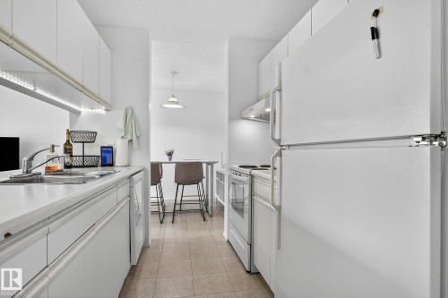 414 4220 139 Avenue, Edmonton, AB - Indoor Photo Showing Kitchen With Double Sink