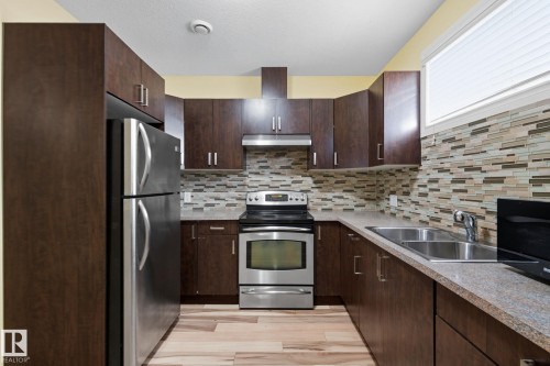 6026 164A Avenue, Edmonton, AB - Indoor Photo Showing Kitchen With Double Sink With Upgraded Kitchen