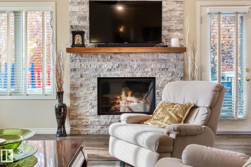 47 1130 Falconer Road, Edmonton, AB - Indoor Photo Showing Living Room With Fireplace