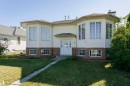 Bi-level home featuring a front yard and brick siding - 8 Lafond Drive, Tofield, AB  - Outdoor 