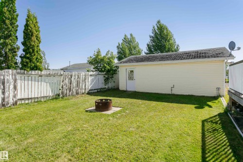 View of yard featuring an outdoor fire pit - 8 Lafond Drive, Tofield, AB - Outdoor