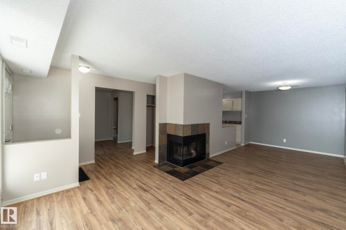 23 14620 26 Street, Edmonton, AB - Indoor With Fireplace