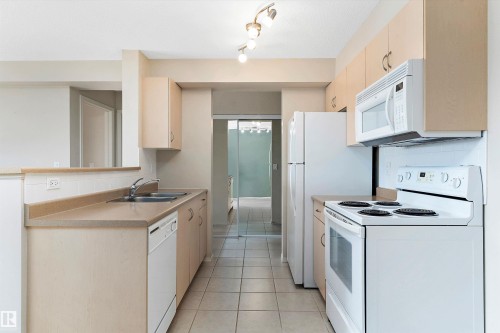 412 17011 67 Avenue, Edmonton, AB - Indoor Photo Showing Kitchen With Double Sink