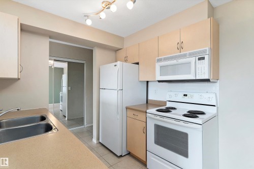 412 17011 67 Avenue, Edmonton, AB - Indoor Photo Showing Kitchen With Double Sink