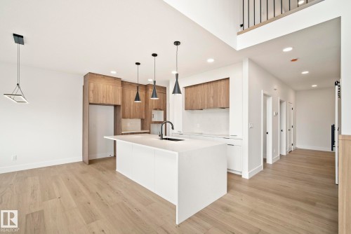 7095 Kiviaq Crescent, Edmonton, AB - Indoor Photo Showing Kitchen With Upgraded Kitchen