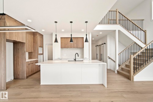 7095 Kiviaq Crescent, Edmonton, AB - Indoor Photo Showing Kitchen With Upgraded Kitchen