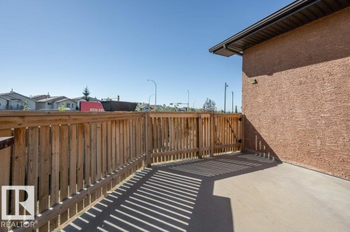View of patio / terrace featuring a residential view - 6221 167A Avenue, Edmonton, AB - Outdoor With Exterior