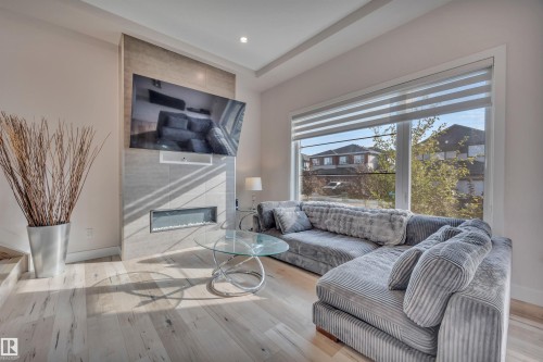 804 Berg Loop, Leduc, AB - Indoor Photo Showing Living Room With Fireplace