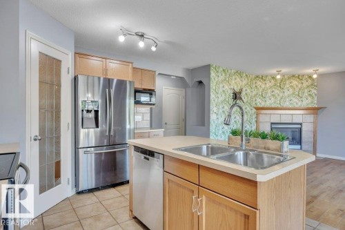 128 Southfork Drive, Leduc, AB - Indoor Photo Showing Kitchen With Double Sink