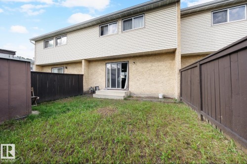 Back of house featuring a fenced backyard and stucco siding - 285 Harrison Drive, Edmonton, AB - Outdoor With Exterior