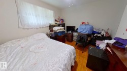 Bedroom featuring wood finished floors - 