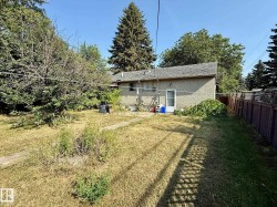 Back of house with stucco siding - 