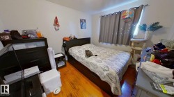 Bedroom with wood-type flooring - 