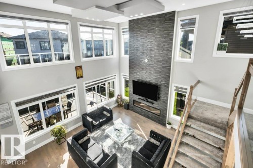 4405 Triomphe Gate, Beaumont, AB - Indoor With Fireplace