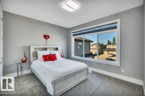 4405 Triomphe Gate, Beaumont, AB - Indoor Photo Showing Bedroom