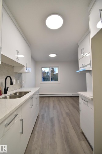 303 12921 127 Street, Edmonton, AB - Indoor Photo Showing Kitchen With Double Sink