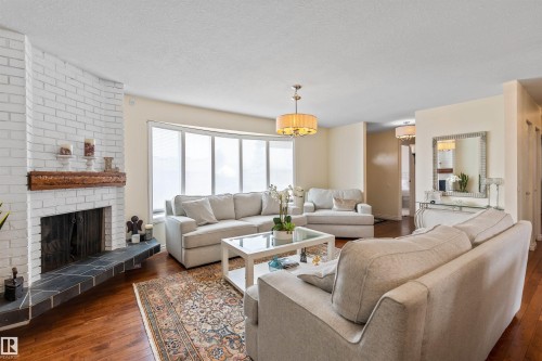 12803 47 Street, Edmonton, AB - Indoor Photo Showing Living Room With Fireplace