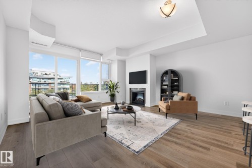 306 2606 109 Street, Edmonton, AB - Indoor Photo Showing Living Room With Fireplace