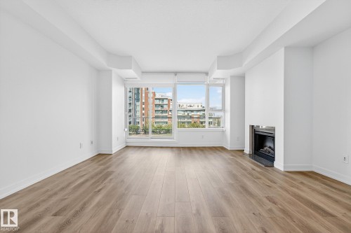 306 2606 109 Street, Edmonton, AB - Indoor Photo Showing Living Room With Fireplace