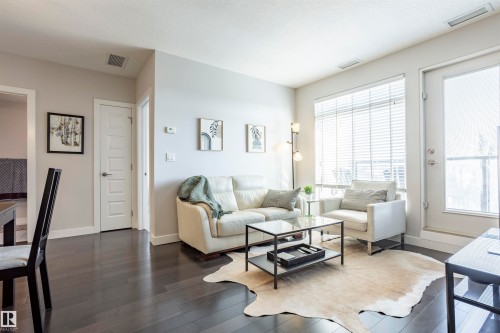 307 5151 Windermere Boulevard Nw, Edmonton, AB - Indoor Photo Showing Living Room