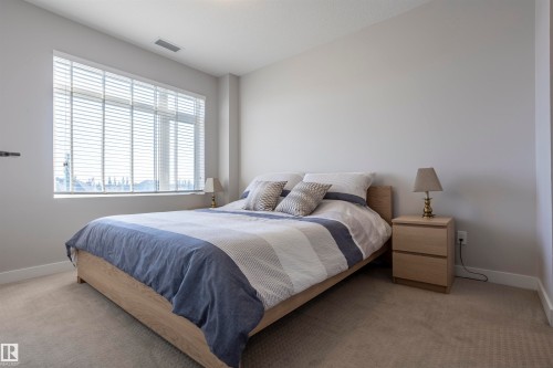 307 5151 Windermere Boulevard Nw, Edmonton, AB - Indoor Photo Showing Bedroom