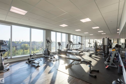 307 5151 Windermere Boulevard Nw, Edmonton, AB - Indoor Photo Showing Gym Room