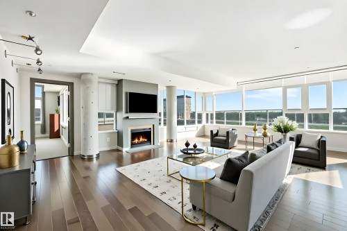 706 2606 109 Street, Edmonton, AB - Indoor Photo Showing Living Room With Fireplace