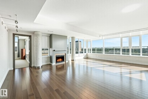 706 2606 109 Street, Edmonton, AB - Indoor Photo Showing Other Room With Fireplace