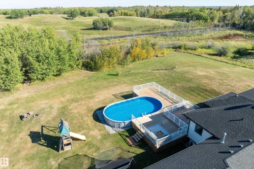 181 20212 Township Road 510, Rural Strathcona County, AB - Outdoor With Above Ground Pool With View