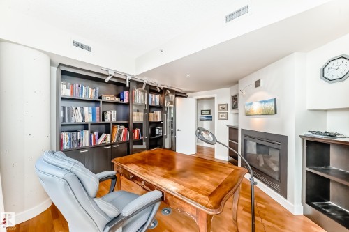 404 10028 119 Street, Edmonton, AB - Indoor With Fireplace